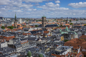 Fototapeta premium Panoramic view of Copenhagen city in sunny day from the City hall tower. Copenhagen, Denmark.
