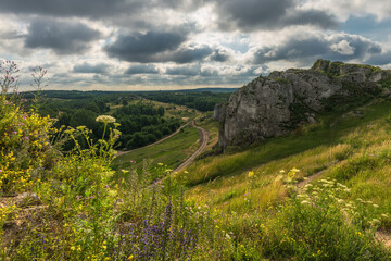 Hilly landscape with a Jurassic limestone rock formation in Cracow-Czestochowa Upland,...