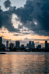 Naklejka premium miami city skyline at sunset florida usa sky clouds panorama downtown sea 