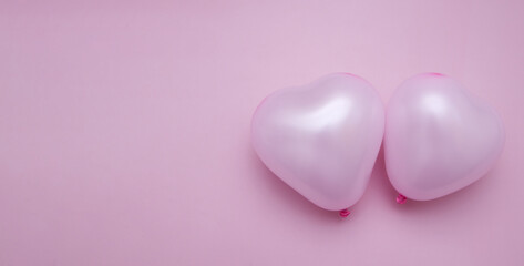 Fototapeta premium valentine's day flat lay with heart shape two balloons monochrome pink