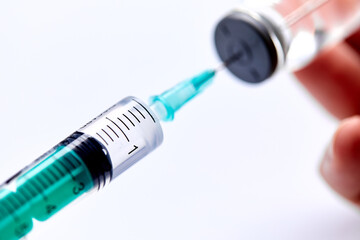  Vaccine in vial with syringe