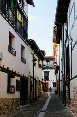 Street in covarrubias with its typical white adobe and half-timbered houses, Burgos, Castilla y Le&oacute;n, Spain.
