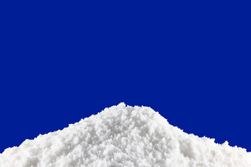 White powder snowdrift on the blue background