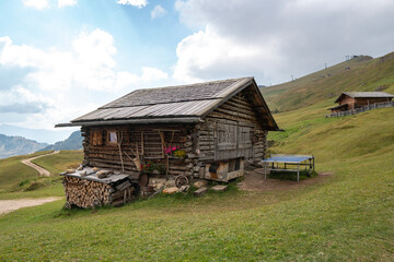 Huts on Seceda mountain under the Odle group, Gardena, South Tyrol