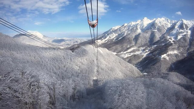 Awesome winter view of mountain landscape from a cable car.