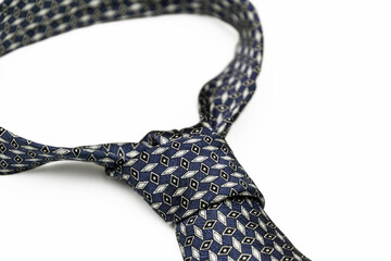 Blue silk tie isolated on white background