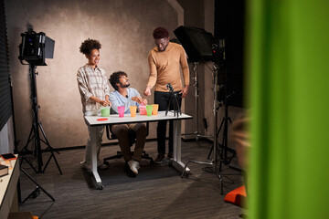 Multiracial people chatting with each other in front of the camera