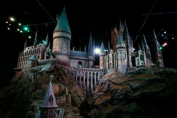 Naklejka premium London, England – July 21, 2016: The Hogwarts Castle at The Making of Harry Potter at Warner Bros. Studio Tour London, A behind-the-scenes walking tour of Harry Potter movies.