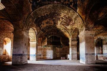 Interior of old abandoned Orthodox church of All saints with remnants of fresco