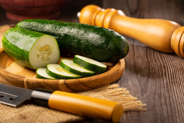 Fresh cucumber sliced ​​on the table.
