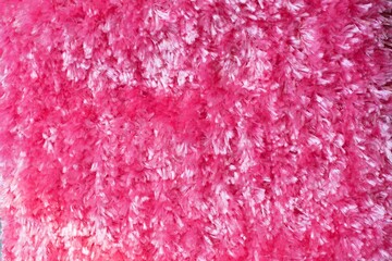Pink fur texture close-up abstract background
