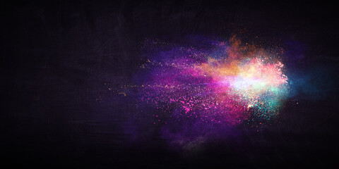 Explosion of colored powder . Mixed media