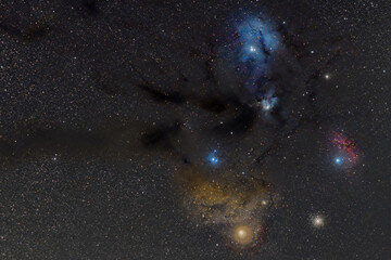 The region of Antares with emission and reflection nebula and globular cluster M4 on the night sky