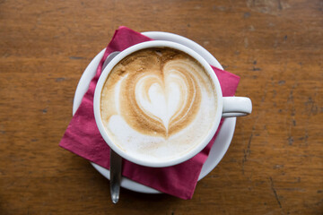 coffe cappuccino heart love wooden background 