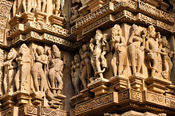 Human sculptures of Vishvanatha Temple, dedicated to Lord Shiva, Western Temples of Khajuraho, Madya Pradesh, India - UNESCO world heritage site. Popular world tourist destination.