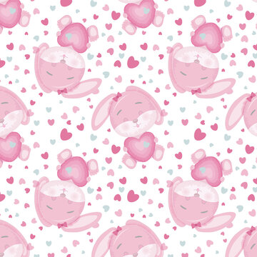 Seamless pattern with a pink little cute bunny hugging a heart.