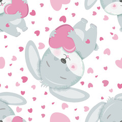 Seamless pattern with a gray bunny with a heart.