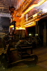 Metallurgical production. Red-hot metal in a vat.