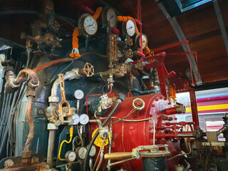 The engine room of a steam locomotive of a ancient train.