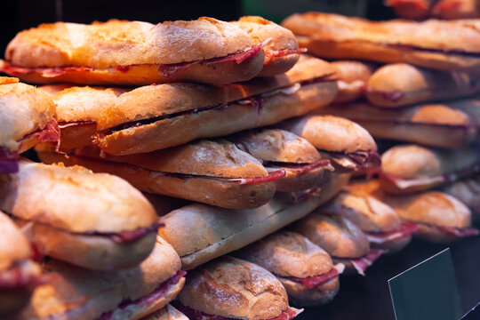 Different spanich sandwich - bocadillo at shop window. High quality photo