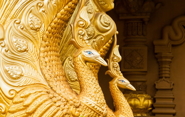 Golden peacocks statues, decoration of Buddhist Monastery, Sri Lanka