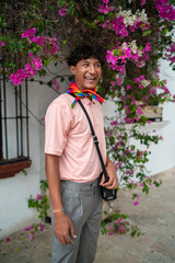 Portrait of an attractive and stylish fashionable young Latin American non-binary teenage girl, confident and happy with her gender identity, outdoors