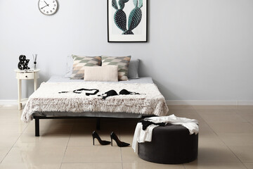 Clothes in bedroom after romantic date
