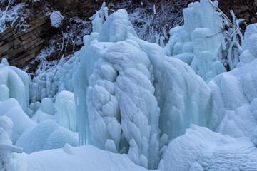 Fototapeta na wymiar Ice flozen world and Ice waterfall 