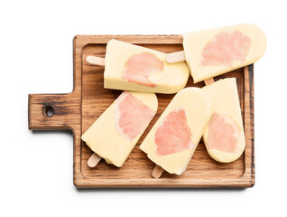 Board with tasty grapefruit ice cream on white background