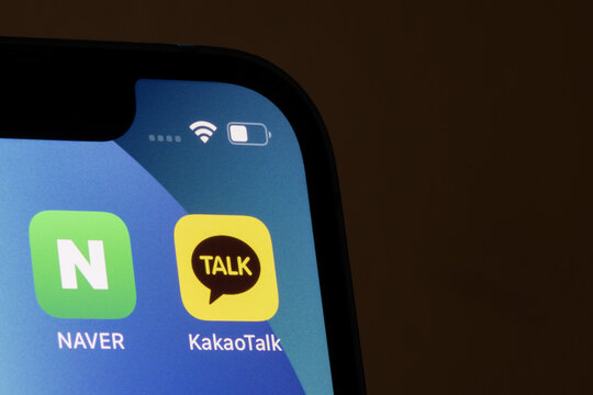 Portland, OR, USA - Jan 10, 2022: KakaoTalk and Naver app icons are seen on an iPhone. Kakao and Naver are South Korea's most dominant online platform providers.