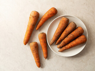 Fresh carrots on marble background 