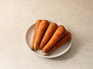 Fresh carrots on marble background 