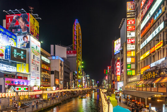Colorful and bright Dotonbori riverside at night in Osaka city, Japan