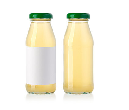 juice in glass bottle isolated on white