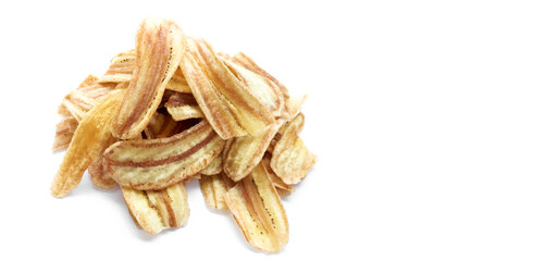 Asian caltivated banana chips or pisang awak banana cracker ro banana chips on white background, soft and selective focus.
