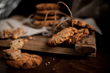 Morning cookies with almonds on the wood board. Selective focus