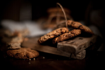 Morning cookies with almonds on the wood board. Selective focus