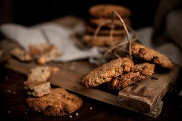Morning cookies with almonds on the wood board. Selective focus