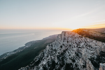 Cape Ai-Petri, Crimea. Beautiful view of the sunset from the hill to the sea