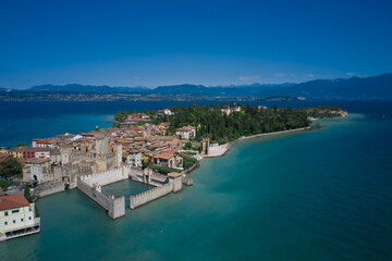 Sirmione, Lake Garda, Italy. Aerial view of Sirmione Castle. In the background blue sky, sunny day, good weather
