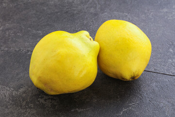 Fresh ripe yellow quince fruit