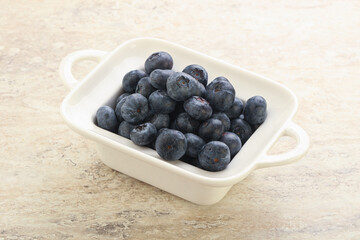 Sweet ripe blueberry heap in the bowl
