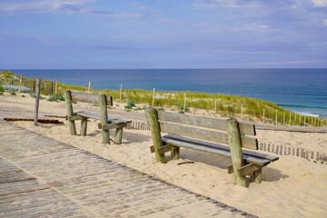 Fototapeta na wymiar wooden bench on atlantic french coast ocean in Arcachon bay