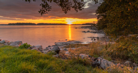 Fototapeta na wymiar A beautiful sunset on the island of Lauttasaari in southern Finland