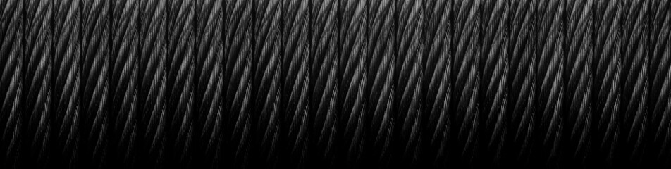 Metal cable. Metal cable winch. Black Steel rope winch close-up. Strong still background