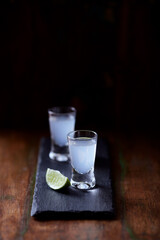 Gin and Tonic on dark background. Close up.	