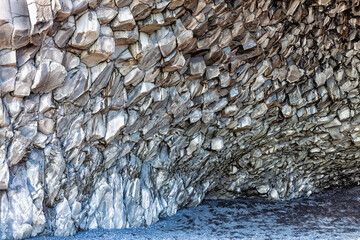 Reynisfjara, a black sand beach with basalt blocks and caves