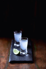 Gin and Tonic on dark background. Close up.	