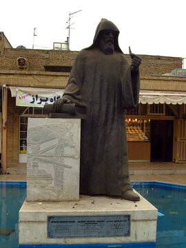 Isfahan, Iran - March 24, 2010: Statue of Archbishop Khachatour Kesaratsi, founder of the first printing house in Iran and The Middle East Holy Savior Vank Cathedral.