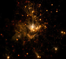 Fototapeta premium Abstrakte Funken von einem Silvester Feuerwerk für Hintergründe
